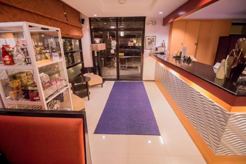 The Red Palm Suites And Restaurant Butuan City Exterior foto